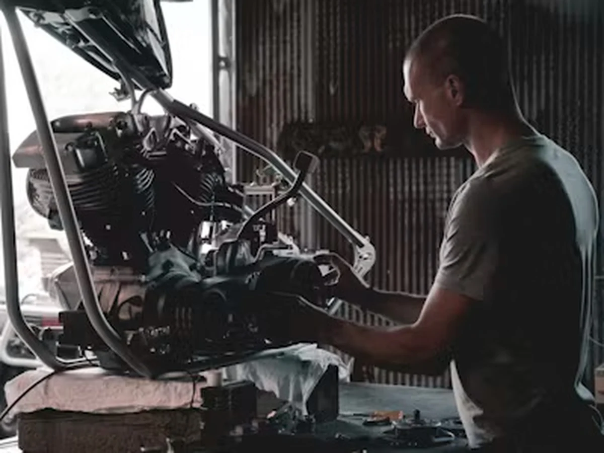 Motorcycle workshop reference showing engine work