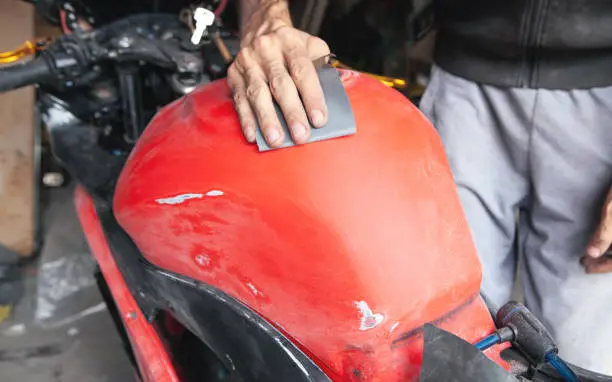 Motorcycle surface preparation before painting